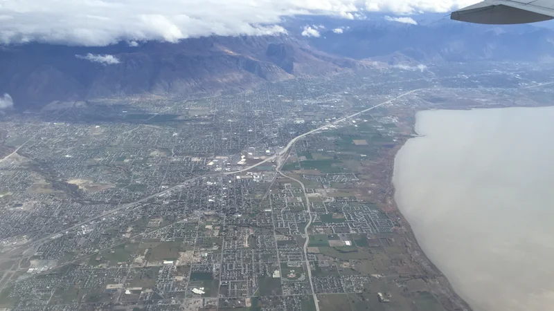 2015-11-03 10 16 13 View from an airplane of the cities of Lehi, American Fork, Pleasant Grove, Lindon and Orem, Utah along Interstate 15 and the northeast shore of Utah Lake.jpg