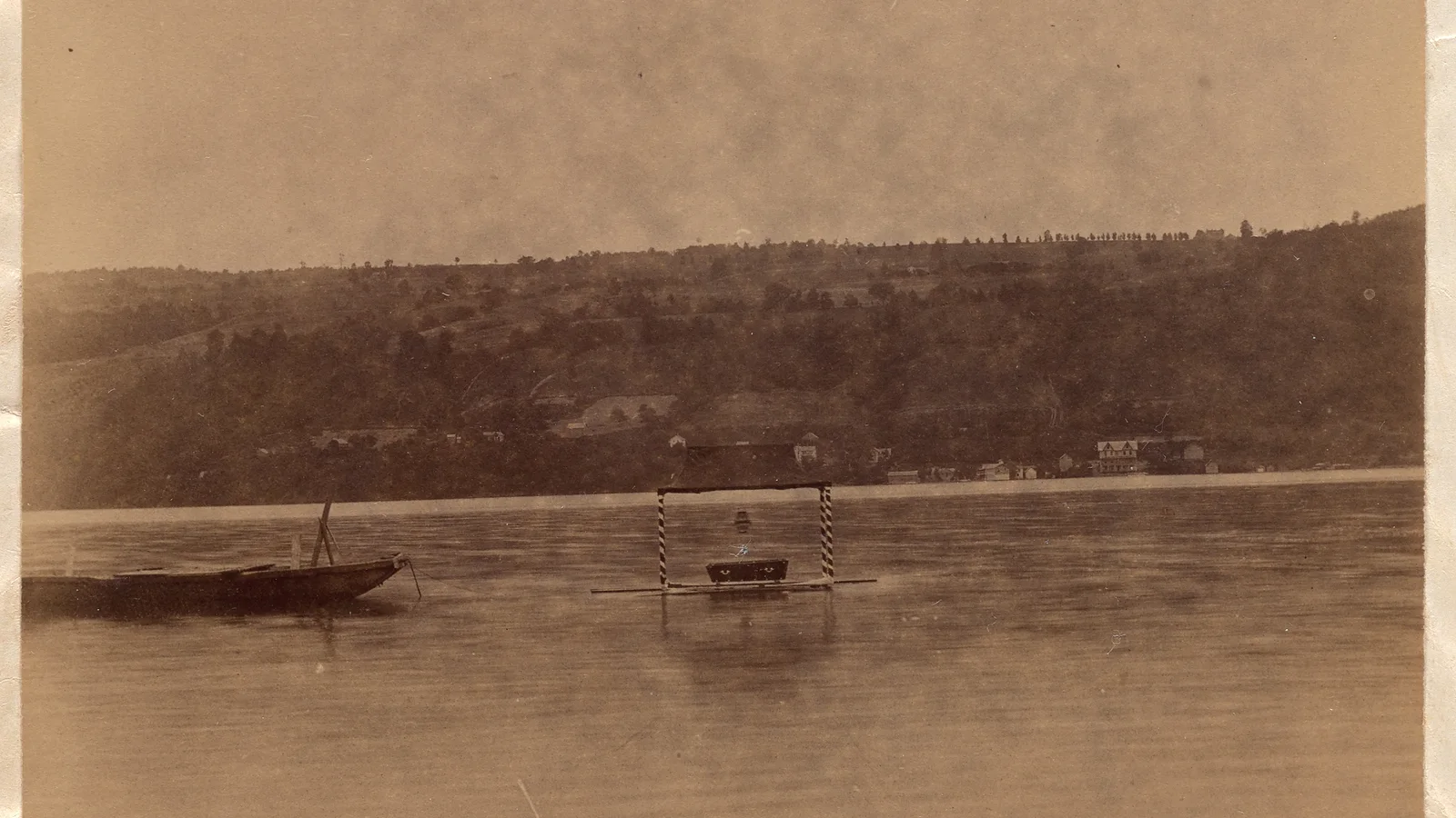 The coffin of Calculus, to be burned on Skaneateles Lake, 1885. Syracuse University Archives.png